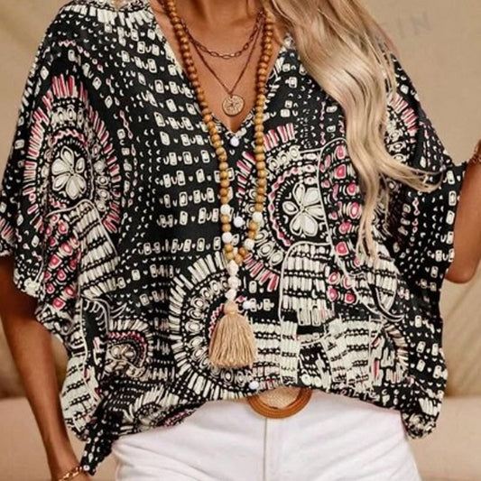 Top holgado de mujer con cuello en V y estampado, con mangas murciélago