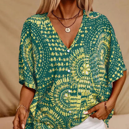 Top holgado de mujer con cuello en V y estampado, con mangas murciélago
