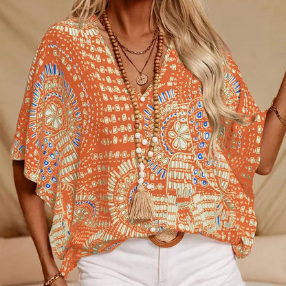 Top holgado de mujer con cuello en V y estampado, con mangas murciélago