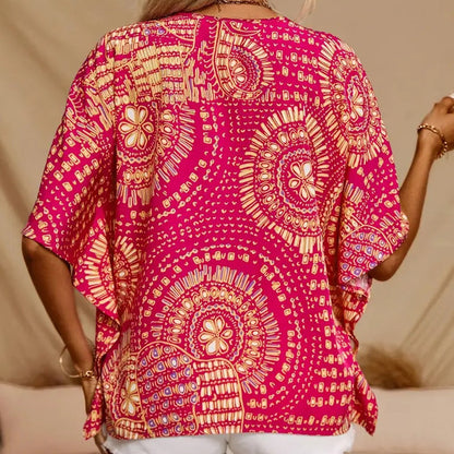 Top holgado de mujer con cuello en V y estampado, con mangas murciélago